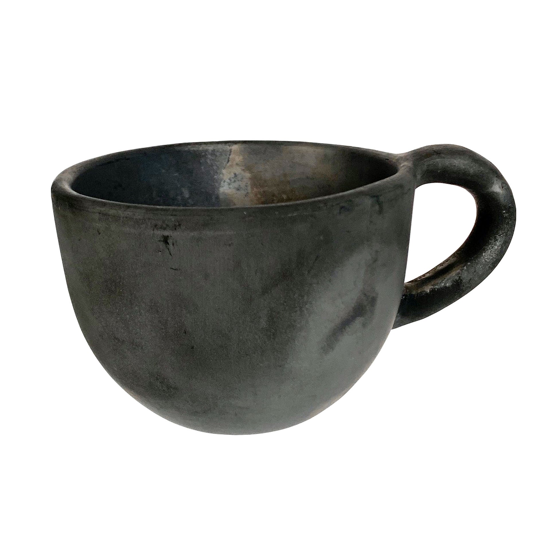 https://www.thecuratedpantry.com/cdn/shop/files/black-clay-mug4.jpg?v=1683242168&width=1946